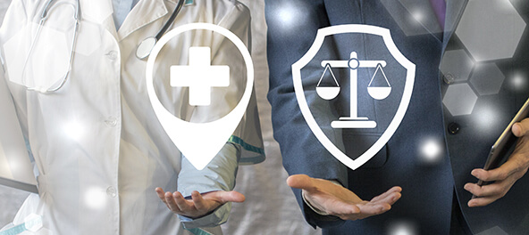 Doctor with hovering medical icon and businessman with hovering scales icon standing side by side